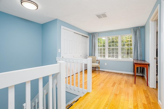 706 Ridgefield Cir Unit A, Clinton, MA 01510 - bedroom with wood finished floors and a closet