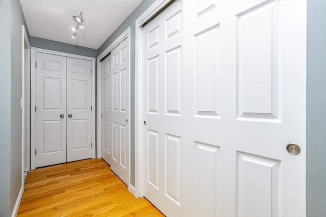 706 Ridgefield Cir Unit A, Clinton, MA 01510 - hallway featuring light wood-style floors