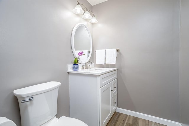 706 Ridgefield Cir Unit A, Clinton, MA 01510 - half bath featuring wood finished floors and vanity