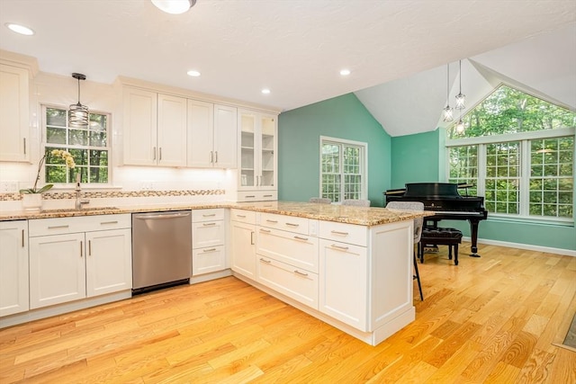 706 Ridgefield Cir Unit A, Clinton, MA 01510 - kitchen featuring stainless steel dishwasher, a peninsula, light wood finished floors, backsplash, and recessed lighting