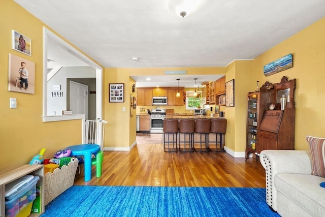 143 Morton St, Winthrop, MA 02152 - living area with light wood-style floors and baseboards