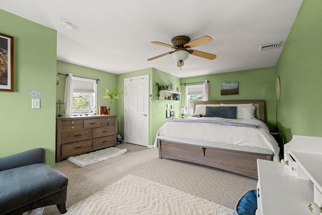 143 Morton St, Winthrop, MA 02152 - carpeted bedroom featuring multiple windows and a ceiling fan