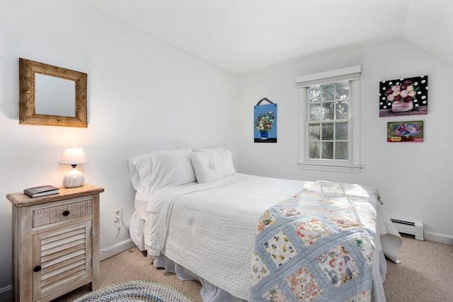 bedroom with a baseboard radiator, vaulted ceiling, and light carpet