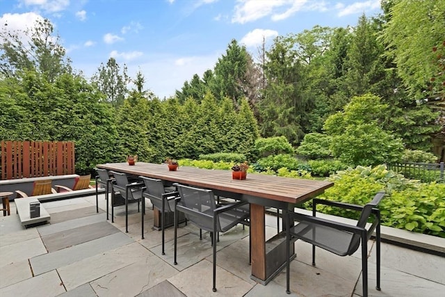 view of patio / terrace featuring a hot tub