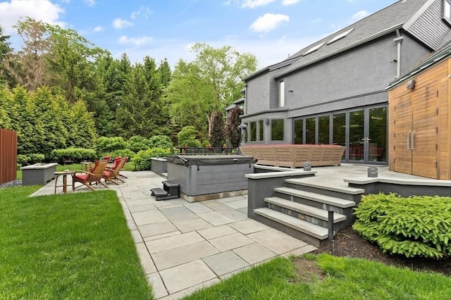 view of patio / terrace featuring a hot tub