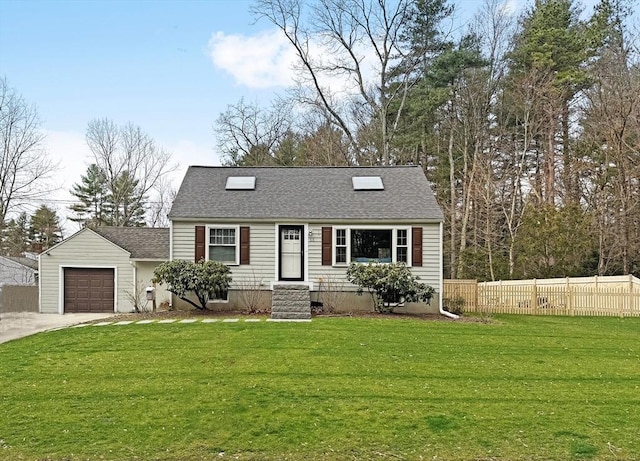 view of front facade with a garage, a shingled roof, a front yard, and fence