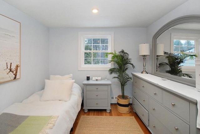 bedroom with light wood-style flooring