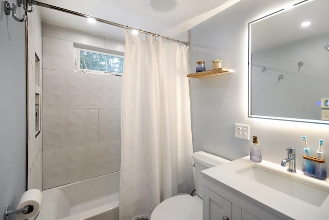 full bathroom with vanity, toilet, and shower / bath combo with shower curtain