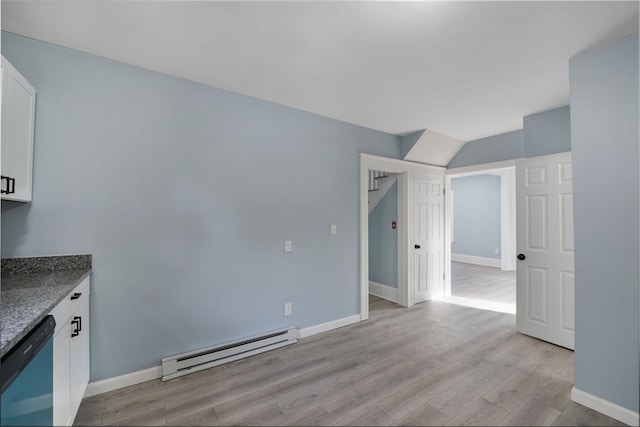 interior space featuring light hardwood / wood-style floors and a baseboard radiator