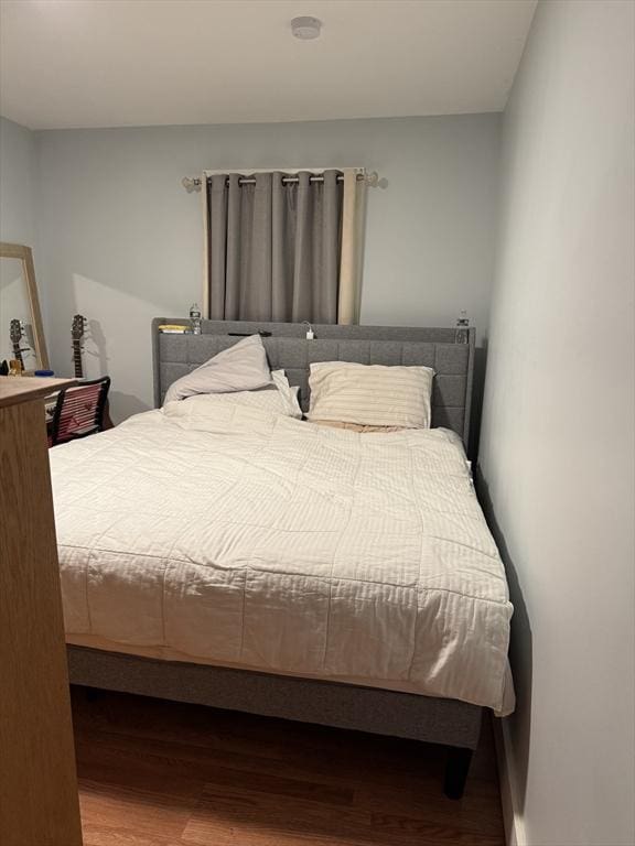bedroom featuring hardwood / wood-style flooring