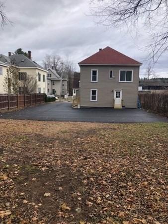 rear view of property featuring a patio area