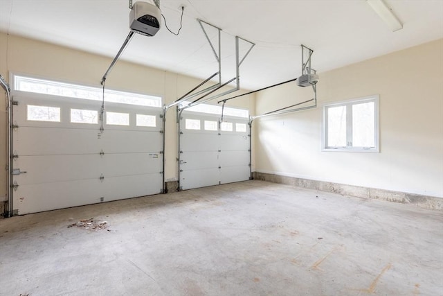 garage featuring a garage door opener