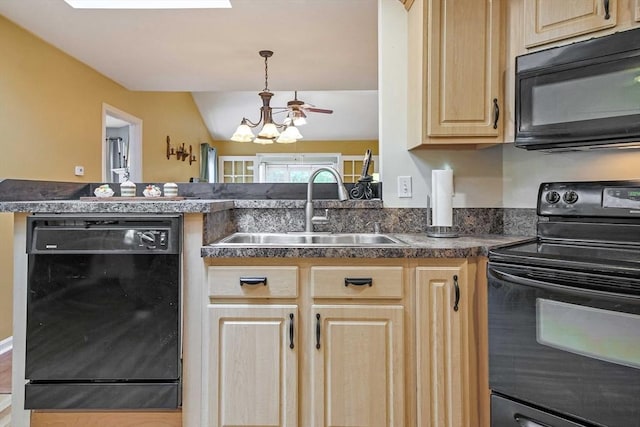 kitchen featuring black appliances, a sink, light brown cabinetry, dark countertops, and vaulted ceiling