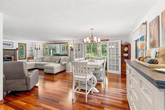 115 Depot, Boxford, MA 01921 - dining space with a chandelier, dark wood-style floors, and healthy amount of natural light
