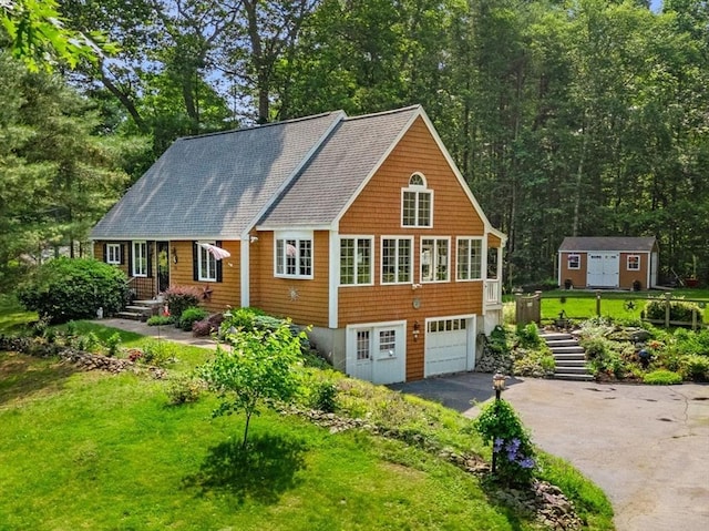 115 Depot, Boxford, MA 01921 - view of front of house featuring asphalt driveway, a front yard, and roof with shingles