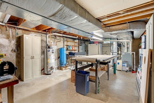 115 Depot, Boxford, MA 01921 - unfinished below grade area featuring water heater, a water pressure tank, and heating unit