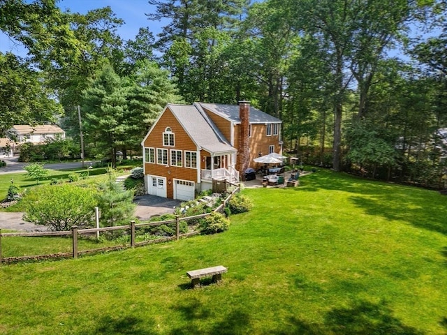 115 Depot, Boxford, MA 01921 - back of property with a chimney, driveway, and a garage