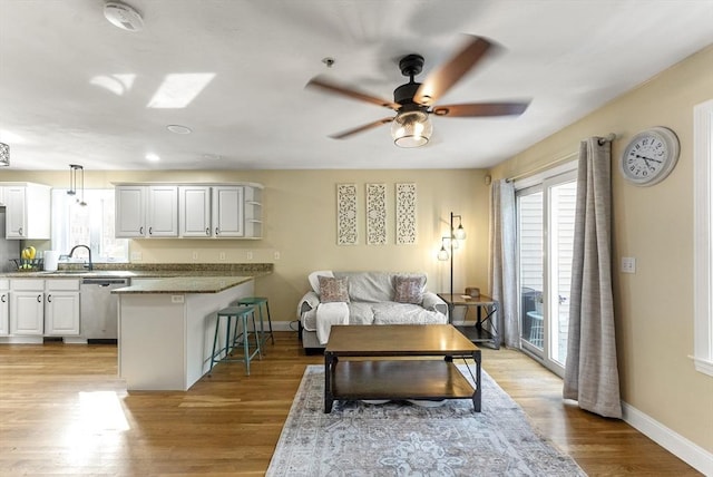20 Copper Lantern Ln Unit 20, Carver, MA 02330 - living room featuring healthy amount of natural light, a ceiling fan, baseboards, and recessed lighting
