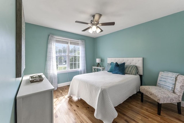 20 Copper Lantern Ln Unit 20, Carver, MA 02330 - bedroom featuring baseboards, light wood-style floors, and ceiling fan
