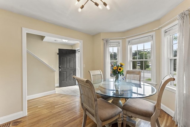 20 Copper Lantern Ln Unit 20, Carver, MA 02330 - dining area with baseboards and light wood finished floors