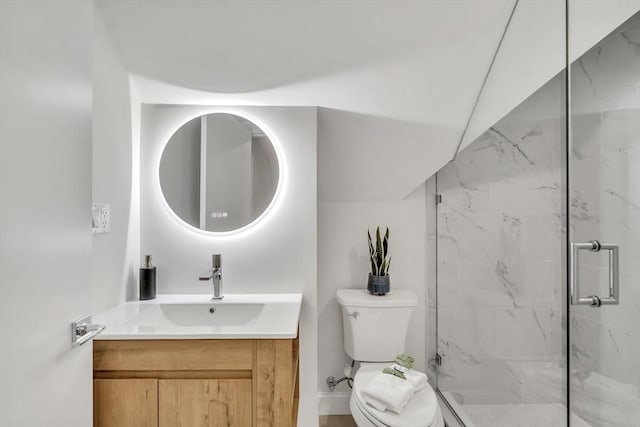 full bath with toilet, a marble finish shower, lofted ceiling, and vanity