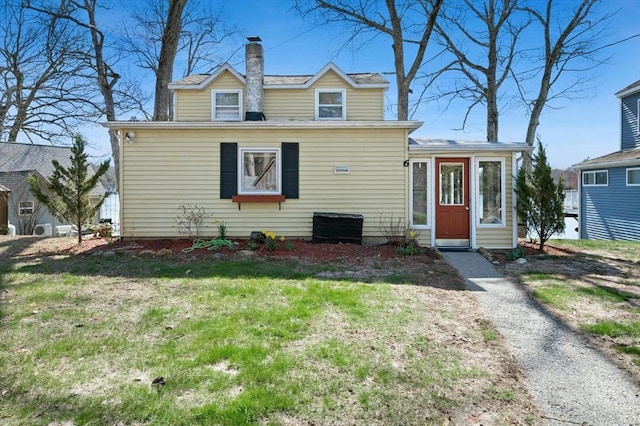 6 Cedar Pond Dr, Sturbridge, MA 01566 - view of front of home featuring a front yard and a chimney