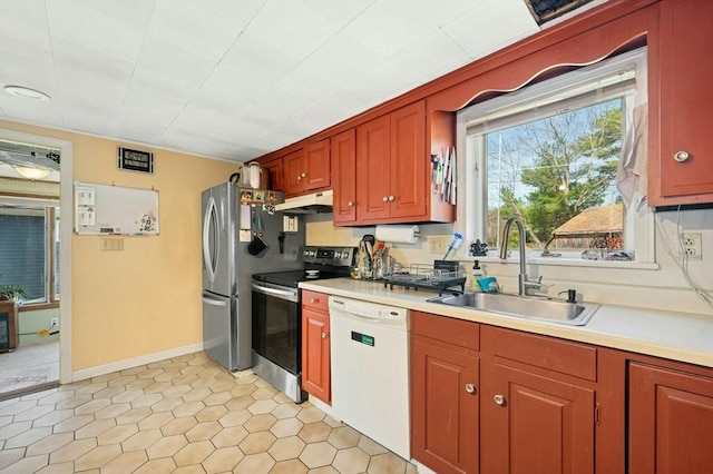 6 Cedar Pond Dr, Sturbridge, MA 01566 - kitchen with stainless steel appliances, under cabinet range hood, light countertops, and light tile patterned flooring