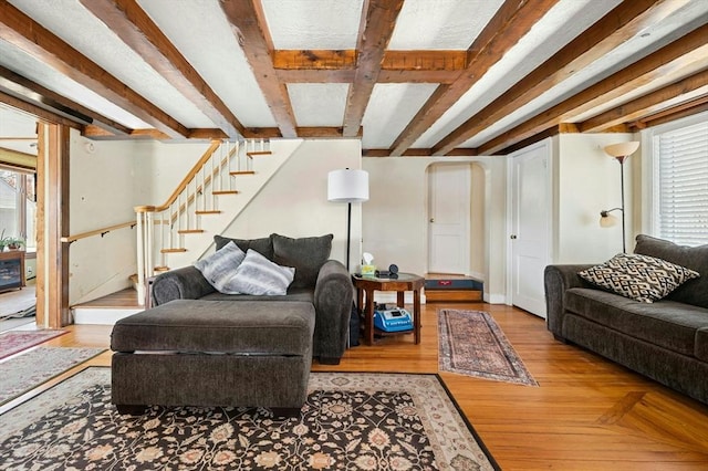 6 Cedar Pond Dr, Sturbridge, MA 01566 - living room featuring stairway, plenty of natural light, and wood finished floors