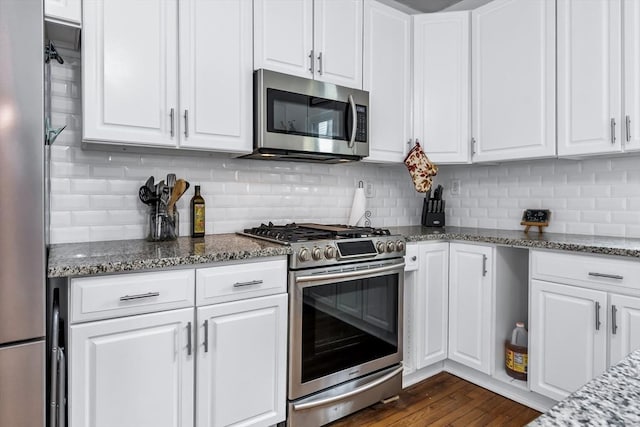 39 High, Haverhill, MA 01832 - kitchen with stainless steel appliances, white cabinetry, and tasteful backsplash
