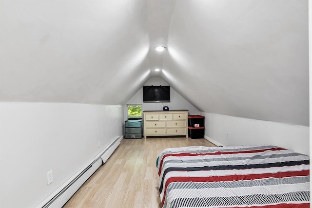 39 High, Haverhill, MA 01832 - bedroom featuring a baseboard radiator, lofted ceiling, and wood finished floors