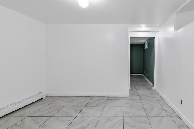 39 High, Haverhill, MA 01832 - unfurnished room featuring light marble finish floors and a baseboard radiator