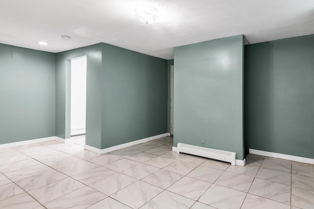 39 High, Haverhill, MA 01832 - spare room featuring a baseboard heating unit and recessed lighting