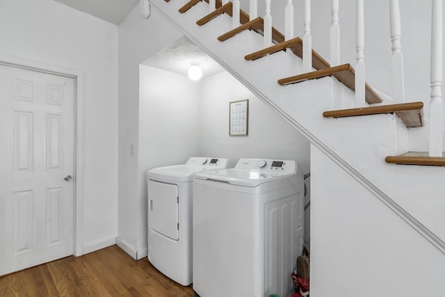 39 High, Haverhill, MA 01832 - laundry room featuring washer and dryer and wood finished floors