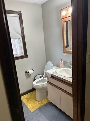 half bath with toilet and vanity