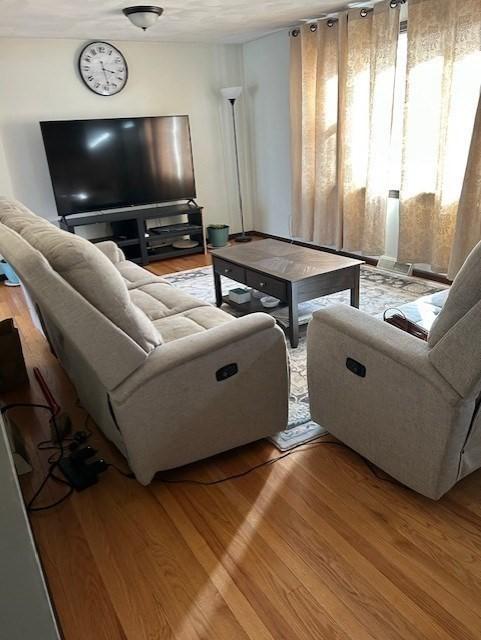 living room featuring light wood-style flooring