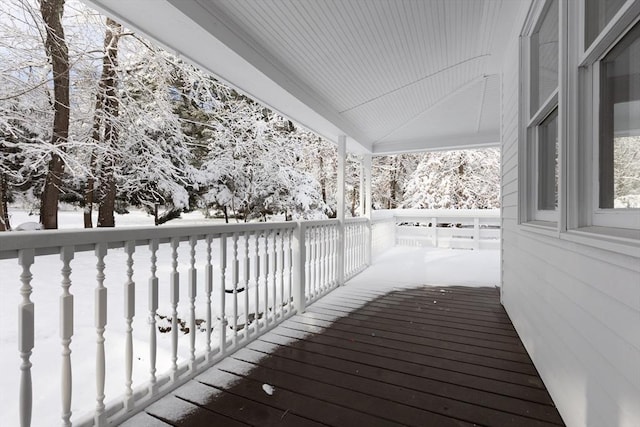 view of snow covered deck