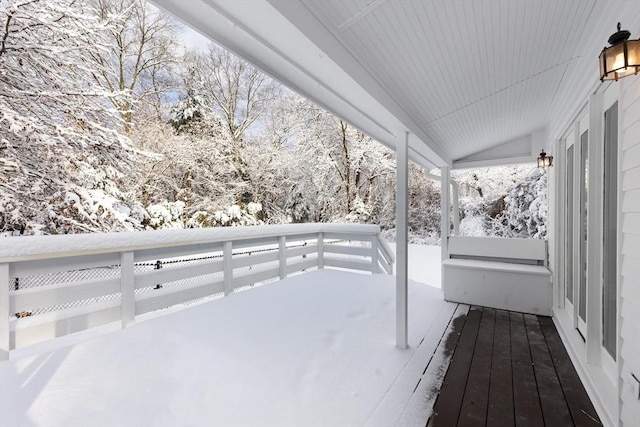 view of snow covered deck