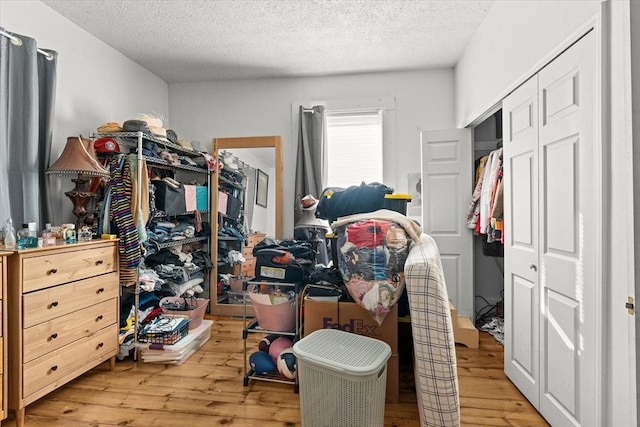 15 Russell St, Worcester, MA 01609 - bedroom with hardwood / wood-style flooring and a textured ceiling