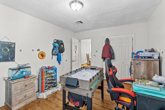 15 Russell St, Worcester, MA 01609 - office area featuring hardwood / wood-style flooring and a textured ceiling