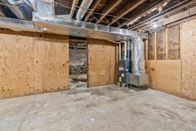 15 Russell St, Worcester, MA 01609 - unfinished below grade area with heating unit