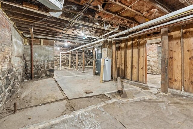 15 Russell St, Worcester, MA 01609 - unfinished below grade area featuring water heater