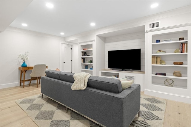 36 Broadway Unit 0, Rockport, MA 01966 - living room with built in shelves, crown molding, light wood-style floors, and recessed lighting