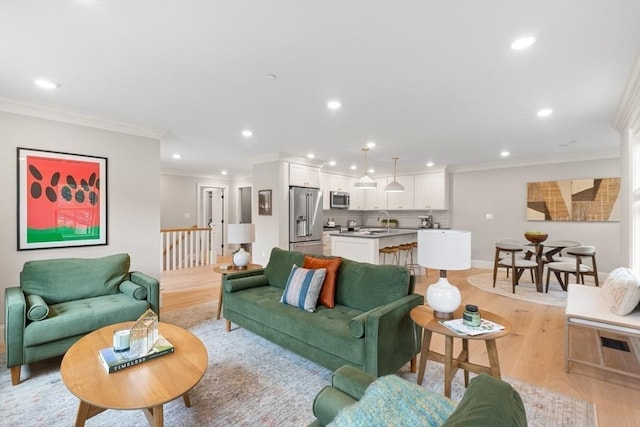36 Broadway Unit 0, Rockport, MA 01966 - living room featuring light wood-type flooring, recessed lighting, and ornamental molding