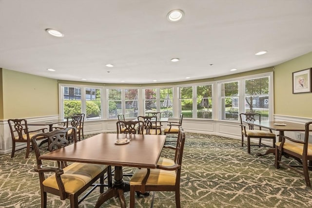 110 Dillingham Ave Unit 212, Falmouth, MA 02540 - carpeted dining space featuring a decorative wall, healthy amount of natural light, wainscoting, and recessed lighting