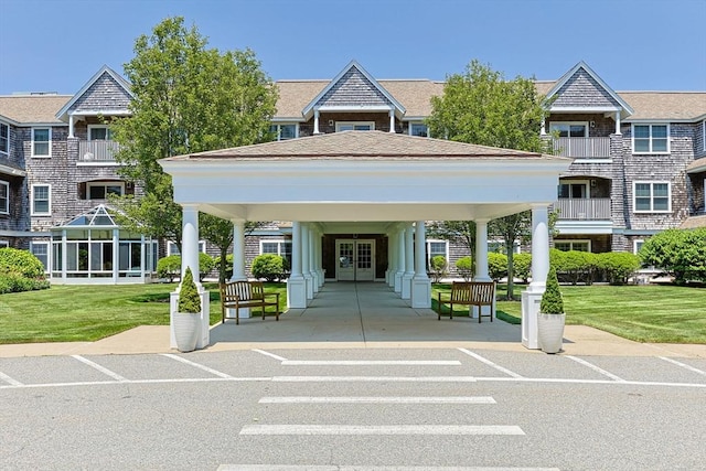 110 Dillingham Ave Unit 212, Falmouth, MA 02540 - view of parking / parking lot featuring french doors and a gazebo