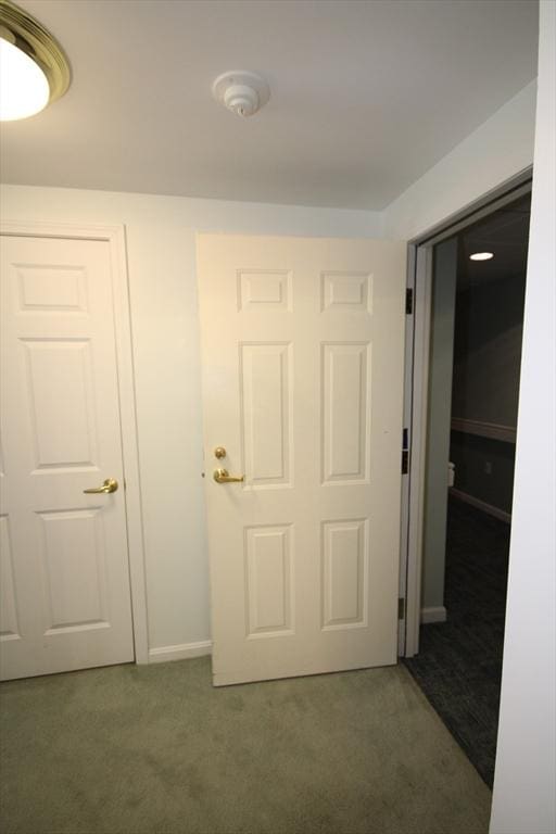 110 Dillingham Ave Unit 212, Falmouth, MA 02540 - hallway with carpet and baseboards