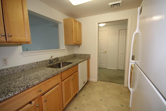 110 Dillingham Ave Unit 212, Falmouth, MA 02540 - kitchen with white appliances and light stone counters