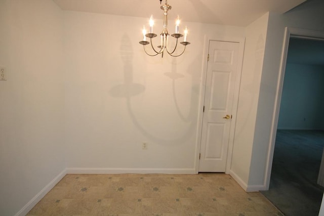 110 Dillingham Ave Unit 212, Falmouth, MA 02540 - unfurnished dining area with a chandelier and light floors