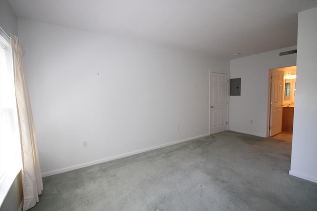 110 Dillingham Ave Unit 212, Falmouth, MA 02540 - spare room featuring electric panel and carpet flooring