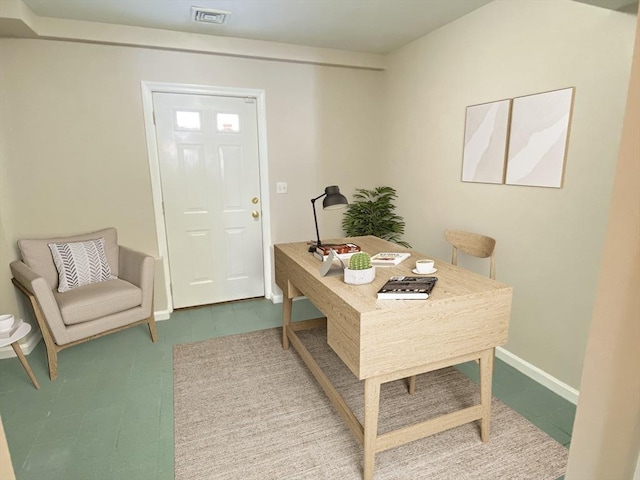 office area featuring visible vents and baseboards